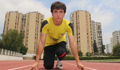 Antrenör annesinin yönlendirmesiyle atletizme başlayan genç, hayalini kurduğu milli formayı giydi